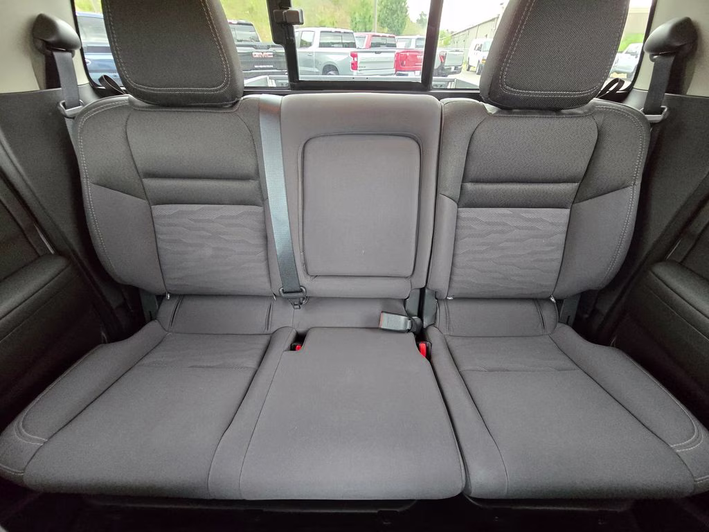 2024 Glacier White Nissan Frontier SV 4X4 Truck