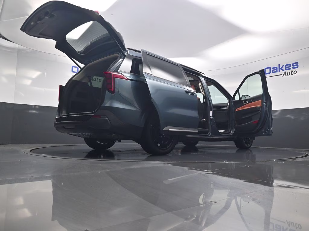 2026 Astra Blue Kia Carnival SX FWD Van