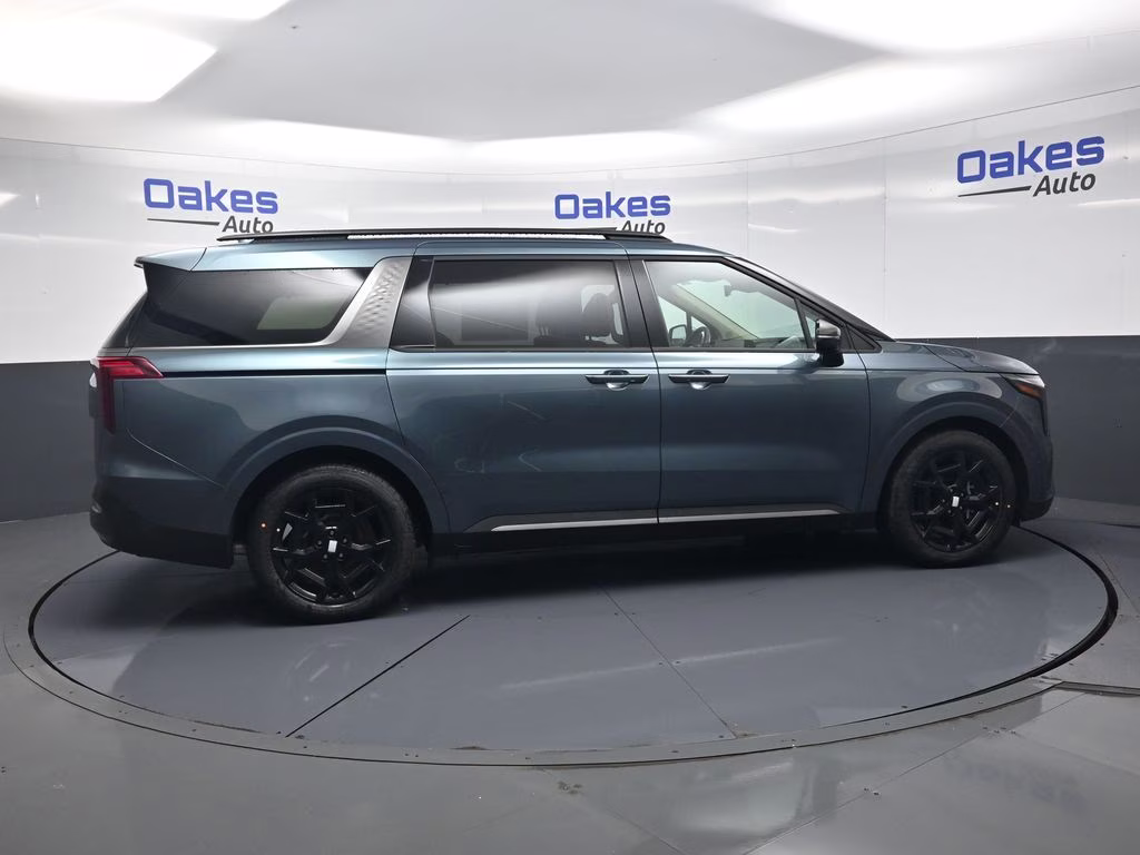 2026 Astra Blue Kia Carnival SX FWD Van