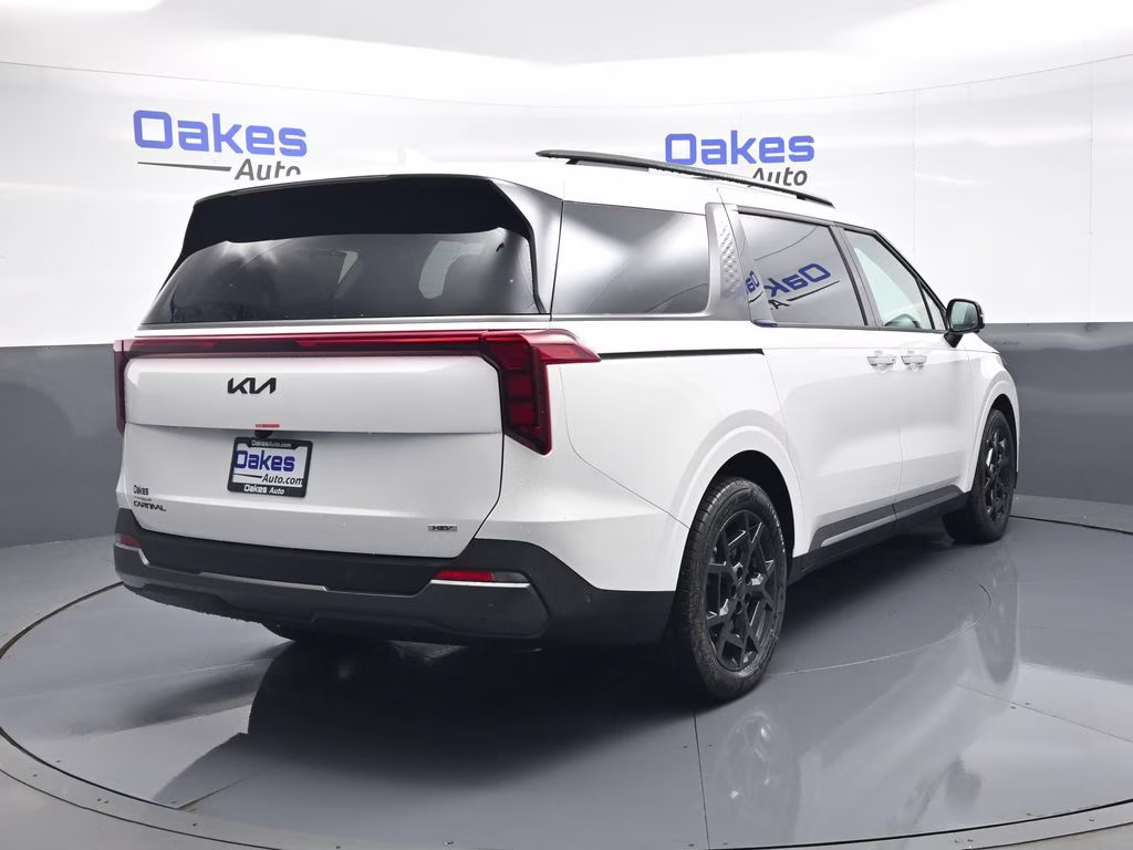 2026 Snow White Pearl Kia Carnival Hybrid SX FWD Van