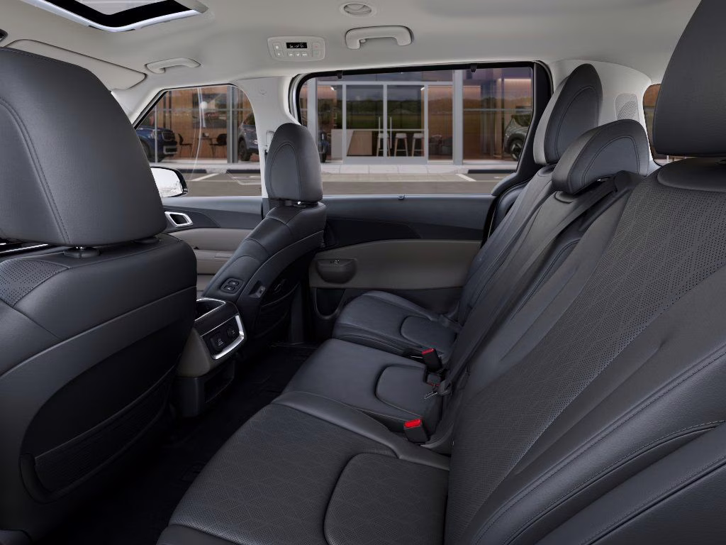 2026 Snow White Pearl Kia Carnival SX FWD Van