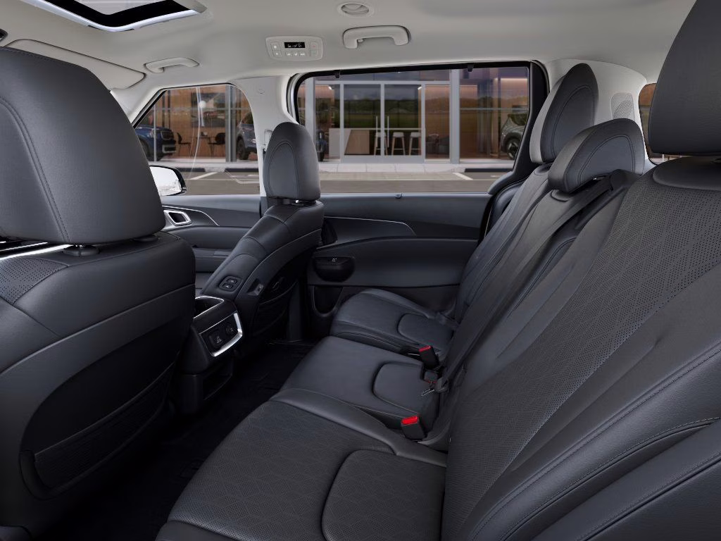 2026 Snow White Pearl Kia Carnival Hybrid SX FWD Van