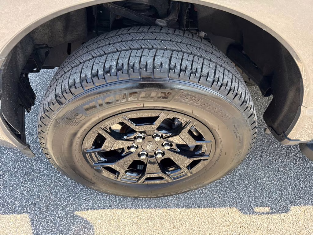 2025 Carbonized Gray Metallic Ford F-150 Lightning XLT AWD Truck