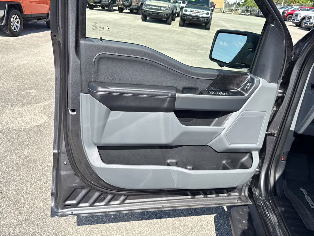 2025 Carbonized Gray Metallic Ford F-150 Lightning XLT AWD Truck