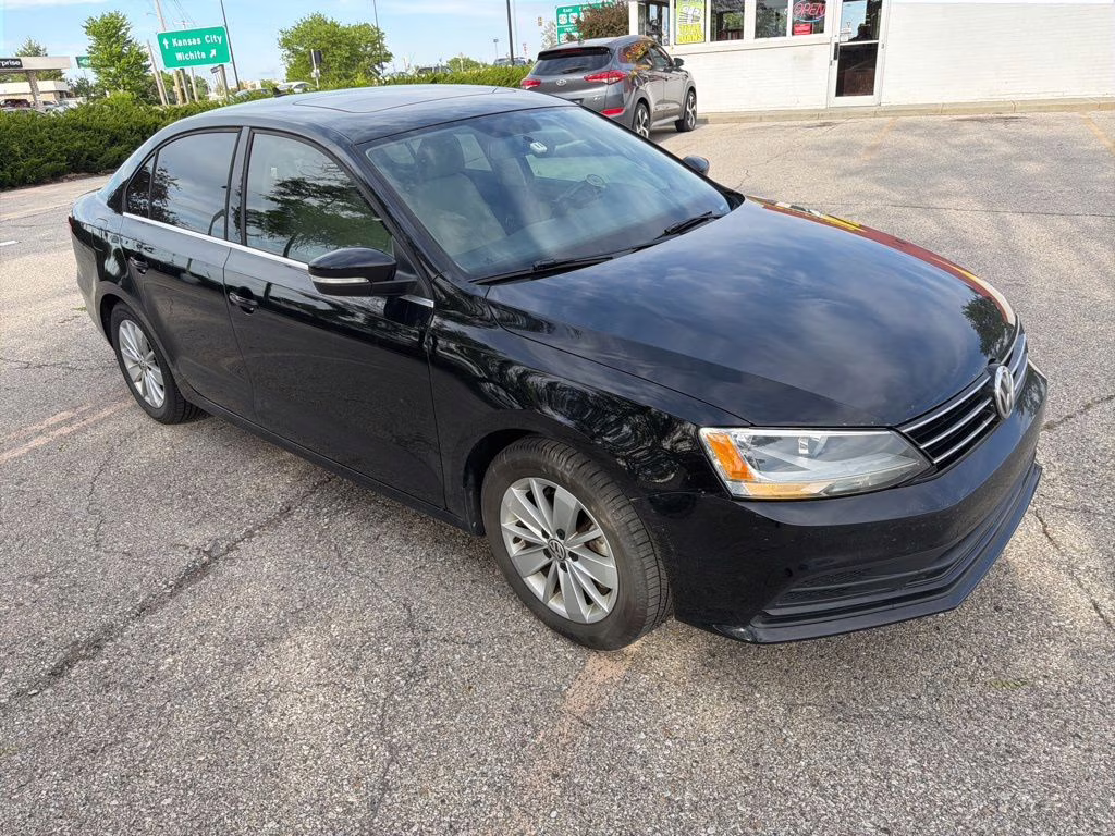 2015 Black Volkswagen Jetta 1.8T SE FWD Sedan