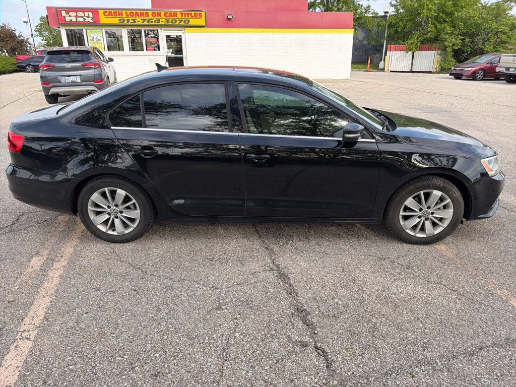 2015 Black Volkswagen Jetta 1.8T SE FWD Sedan