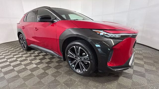 2023 Supersonic Red w/Black Roof Toyota bZ4X Limited AWD SUV
