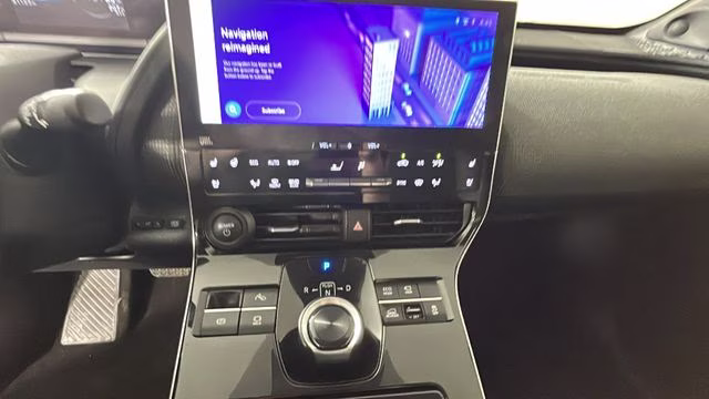 2023 Supersonic Red w/Black Roof Toyota bZ4X Limited AWD SUV