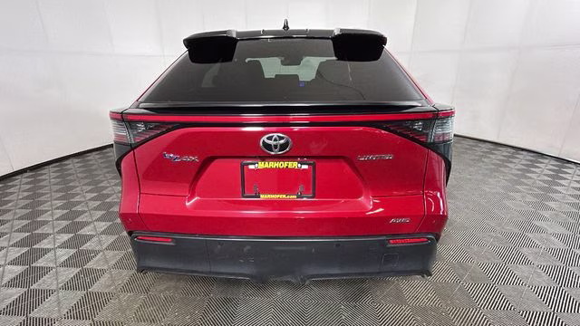 2023 Supersonic Red w/Black Roof Toyota bZ4X Limited AWD SUV