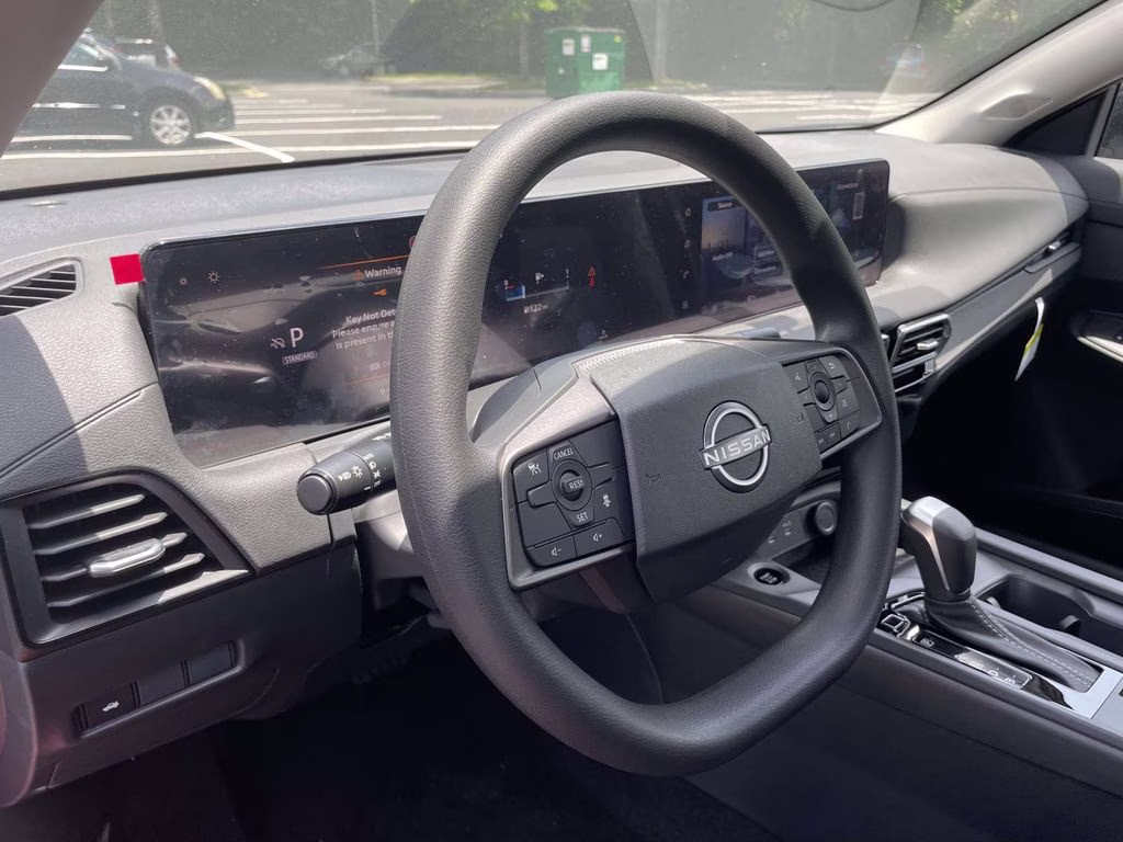 2026 Scarlet Ember Tintcoat Nissan Sentra SV FWD Sedan