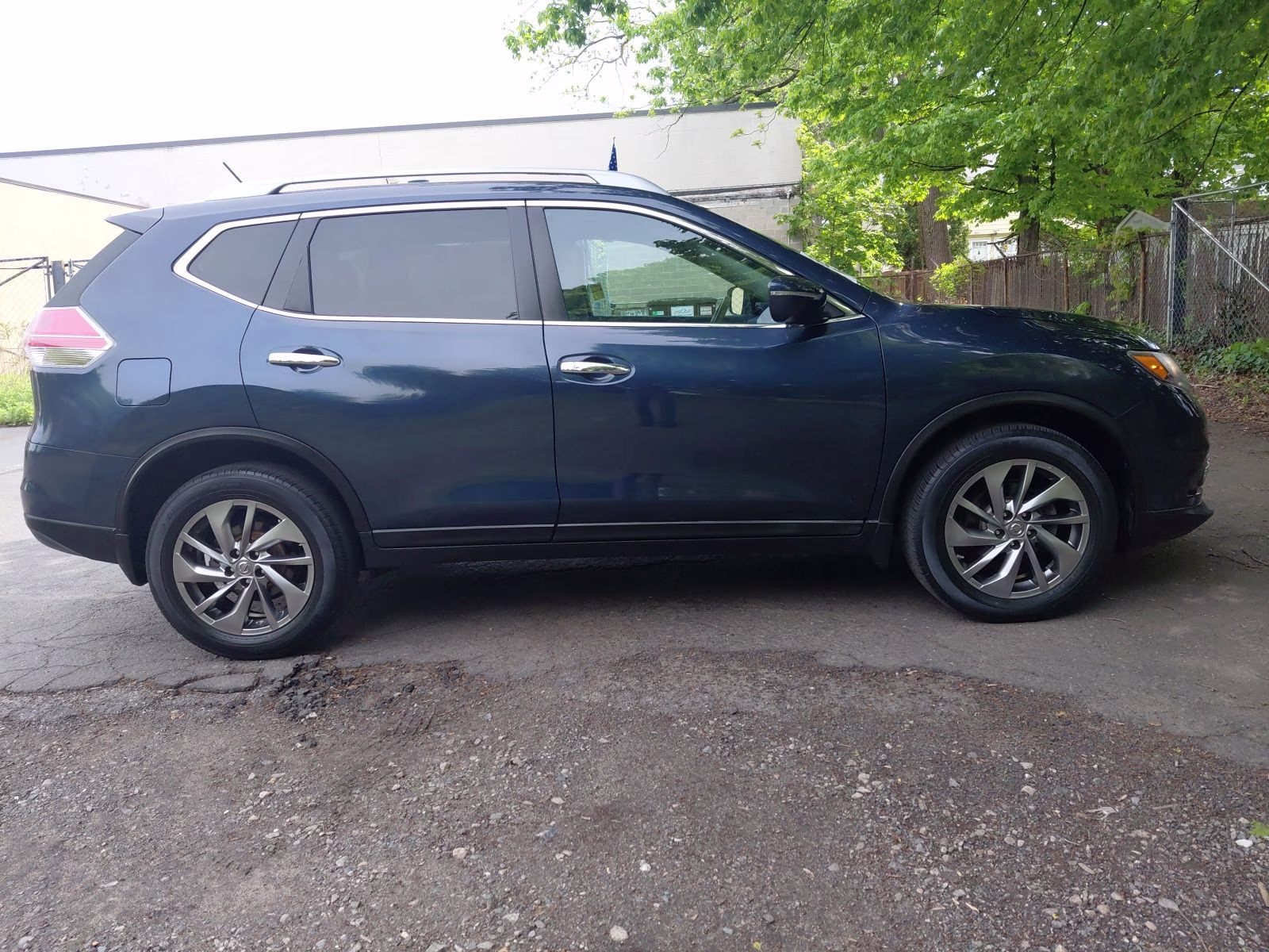 2015 Arctic Blue Metallic Nissan Rogue SL AWD SUV