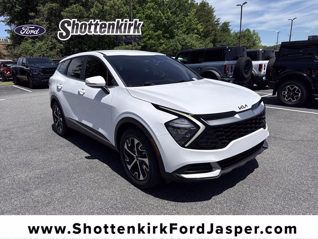 2023 Glacial White Pearl Kia Sportage EX FWD SUV