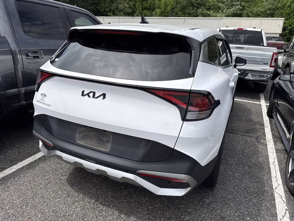 2023 Glacial White Pearl Kia Sportage EX FWD SUV
