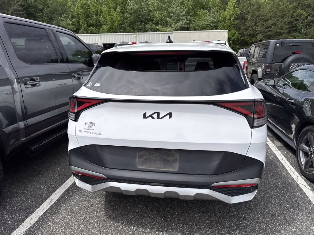 2023 Glacial White Pearl Kia Sportage EX FWD SUV