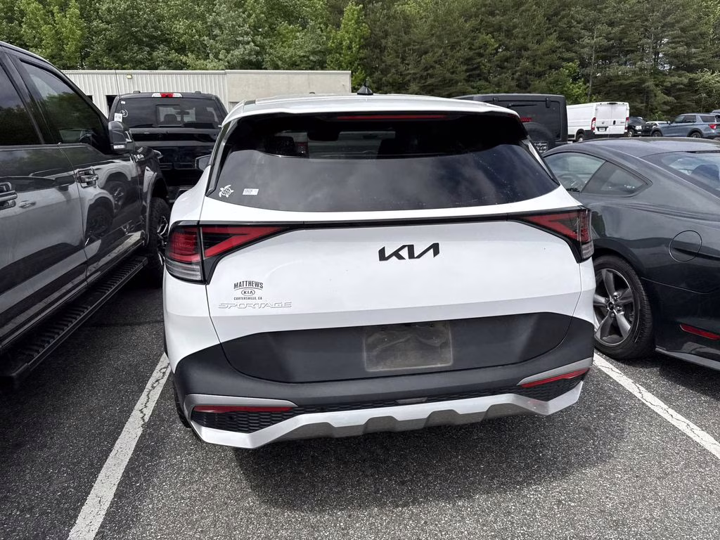 2023 Glacial White Pearl Kia Sportage EX FWD SUV