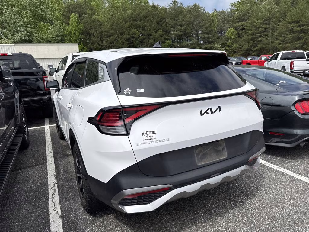 2023 Glacial White Pearl Kia Sportage EX FWD SUV
