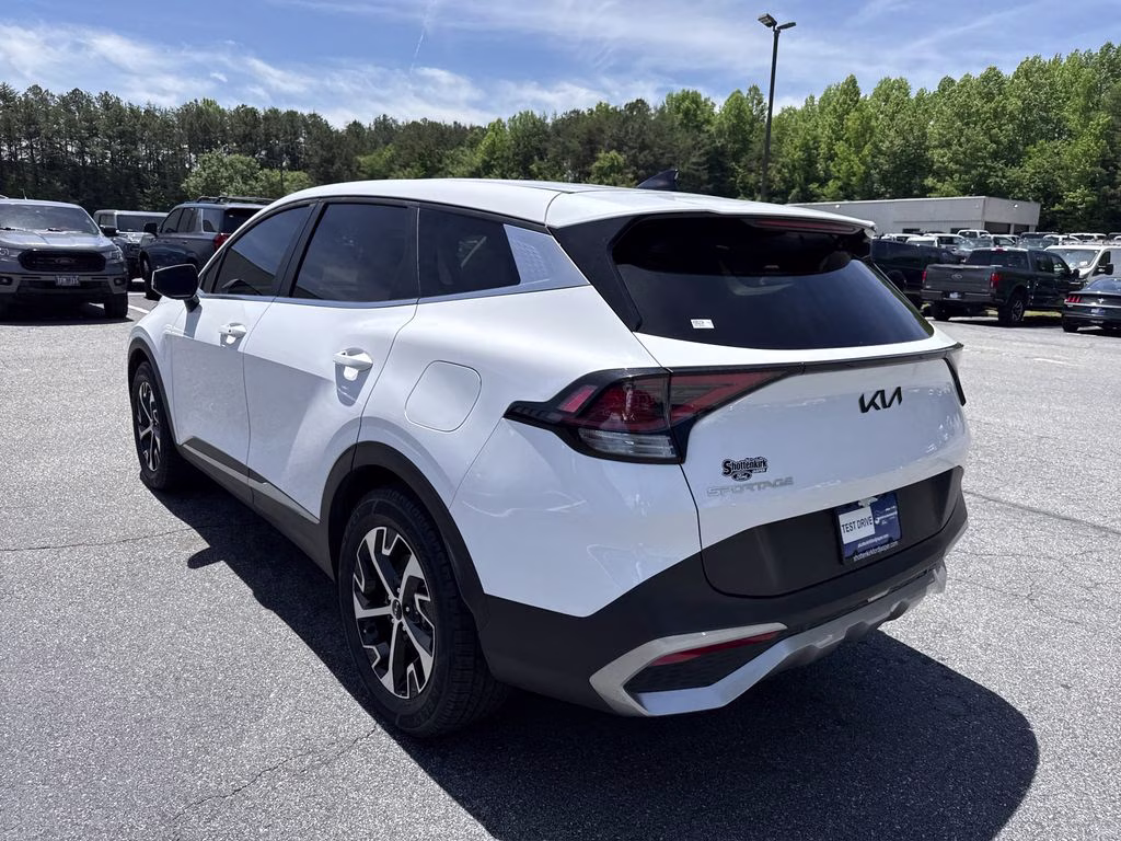 2023 Glacial White Pearl Kia Sportage EX FWD SUV
