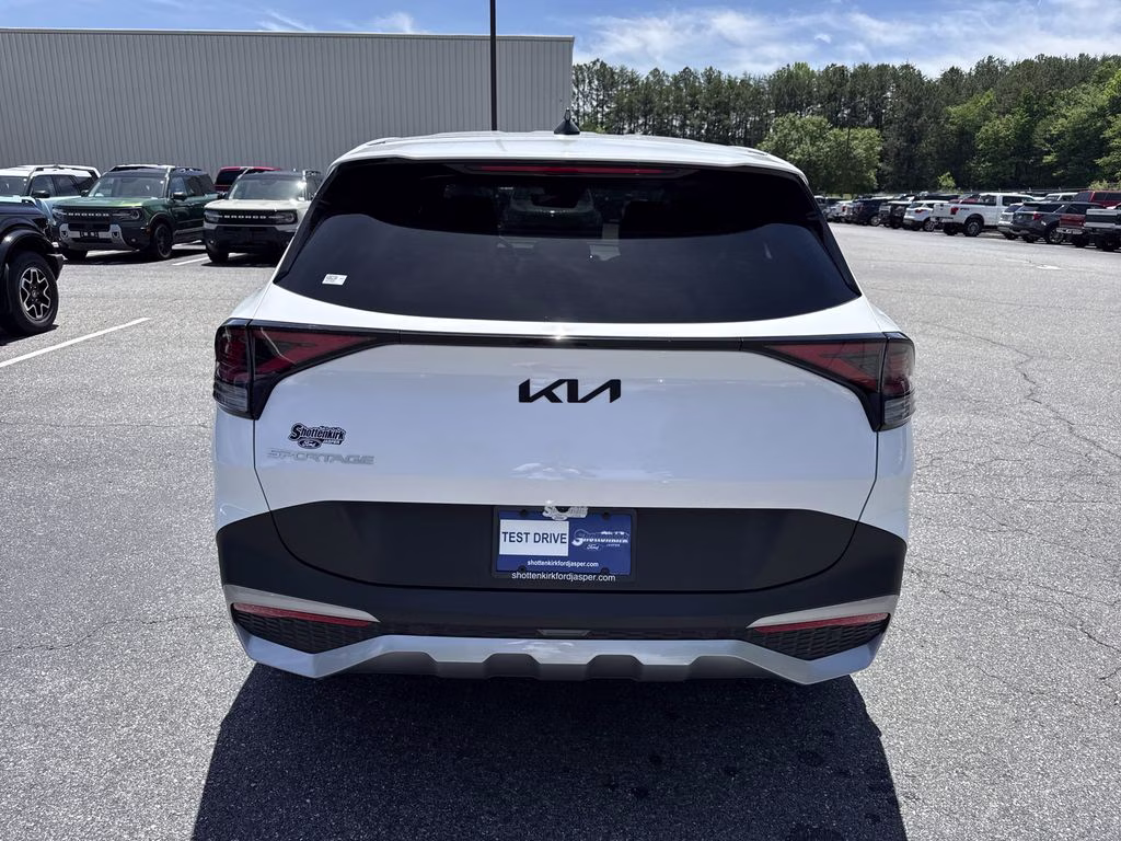 2023 Glacial White Pearl Kia Sportage EX FWD SUV
