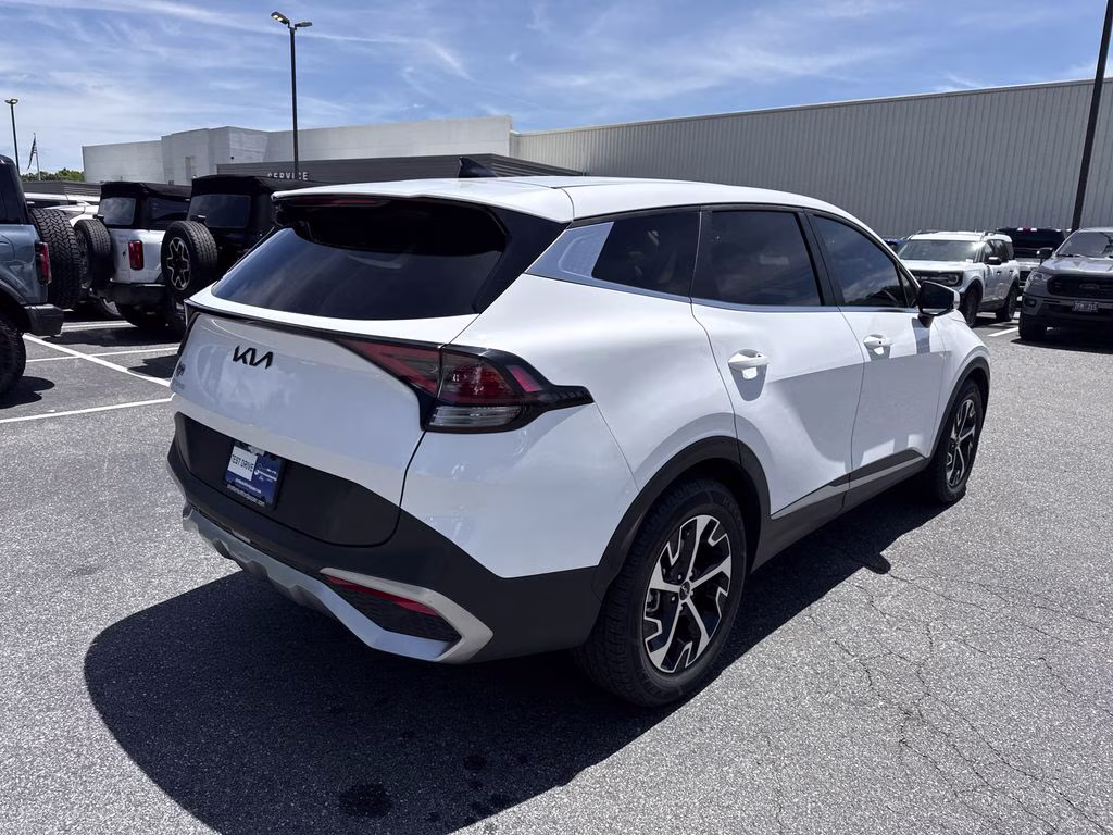2023 Glacial White Pearl Kia Sportage EX FWD SUV