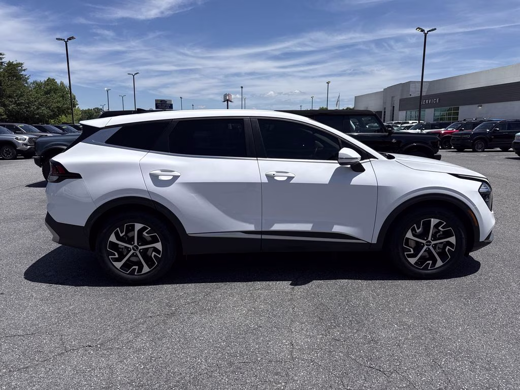 2023 Glacial White Pearl Kia Sportage EX FWD SUV