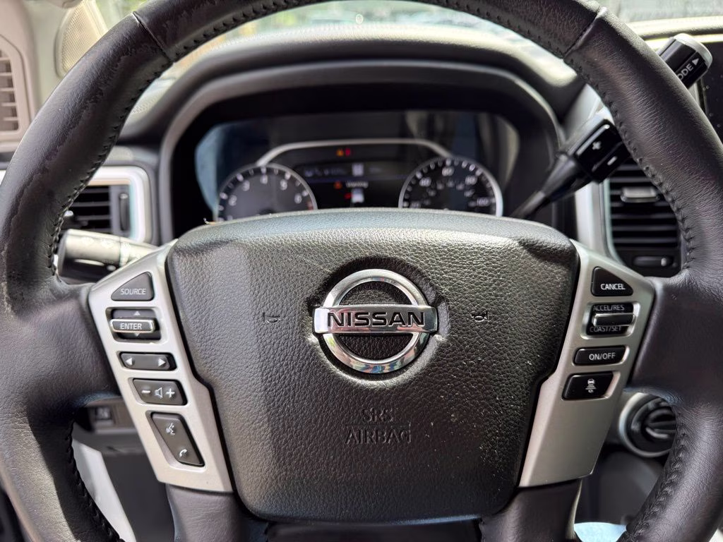 2021 Pearl White Metallic Nissan Titan SL 4X4 Truck