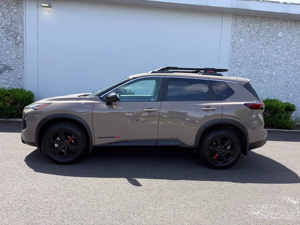 2025 Baja Storm Metallic Nissan Rogue Rock Creek AWD SUV