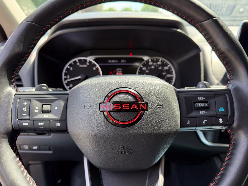 2025 Baja Storm Metallic Nissan Rogue Rock Creek AWD SUV
