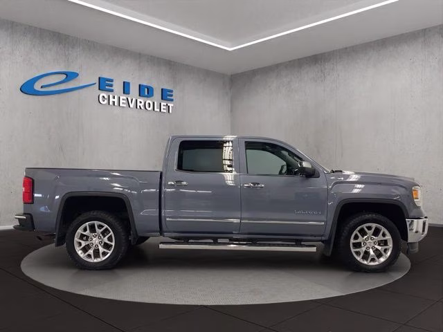 2015 Light Steel Gray Metallic GMC Sierra 1500 SLT 4X4 Truck
