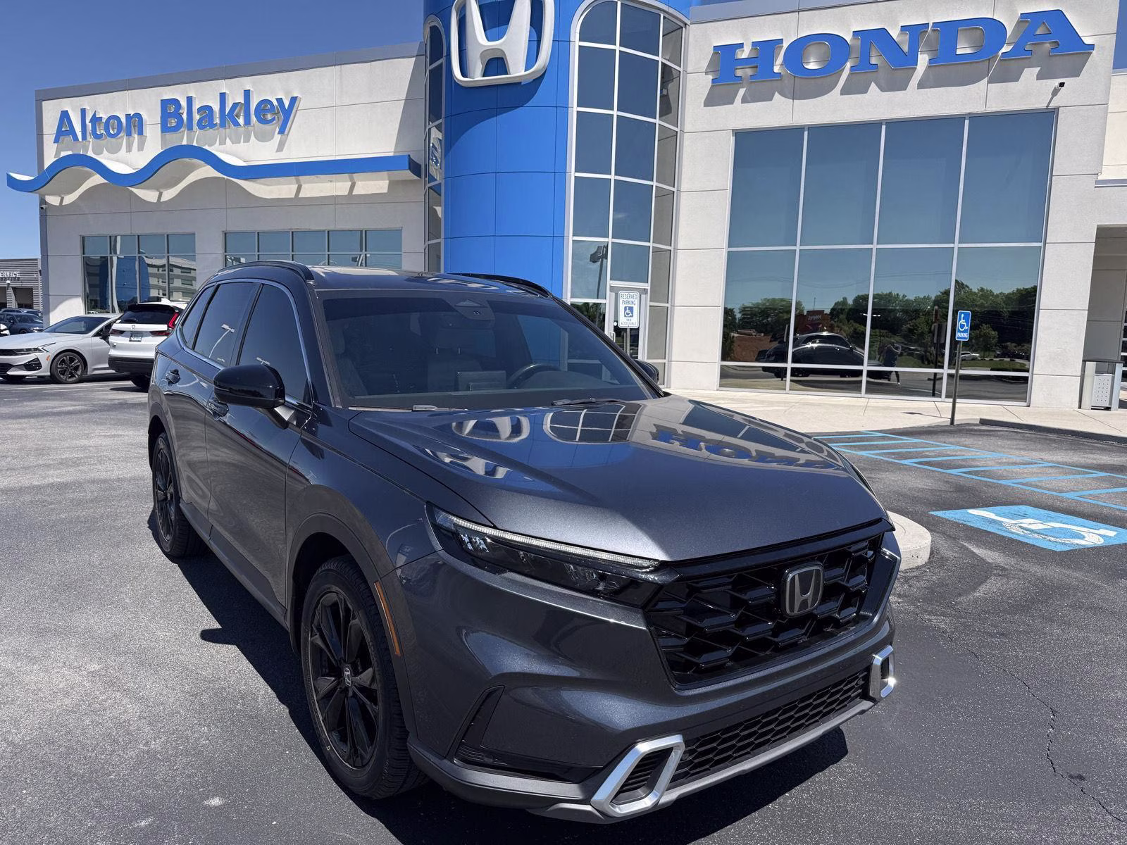 2023 Meteorite Gray Metallic Honda CR-V Hybrid Sport Touring AWD SUV