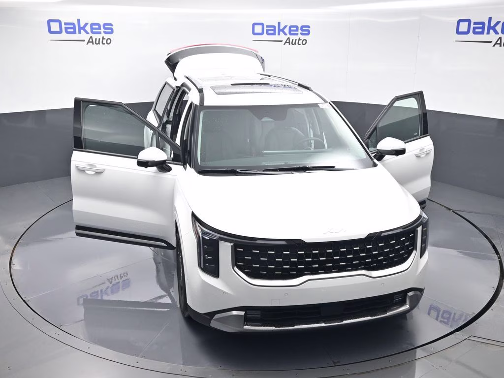 2026 Snow White Pearl Kia Carnival SX FWD Van