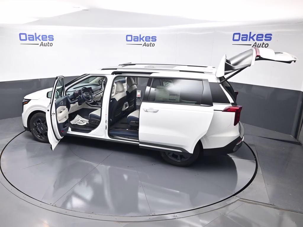 2026 Snow White Pearl Kia Carnival SX FWD Van
