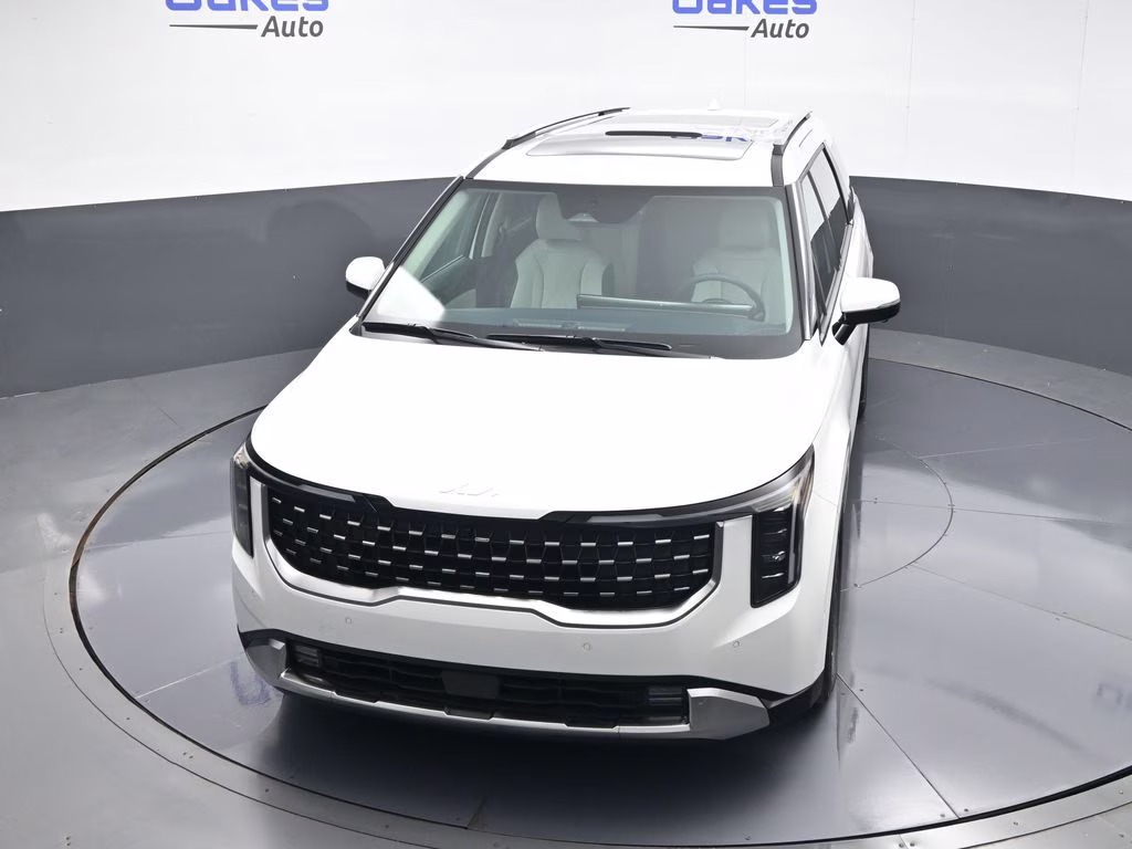 2026 Snow White Pearl Kia Carnival SX FWD Van