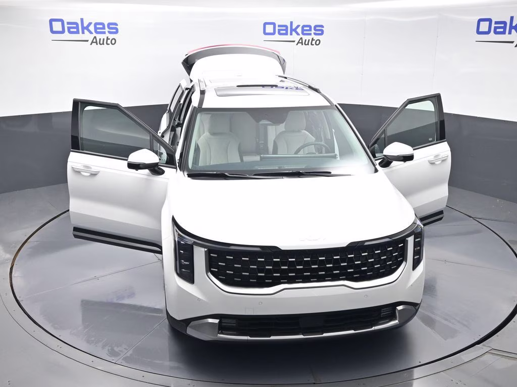 2026 Snow White Pearl Kia Carnival SX FWD Van