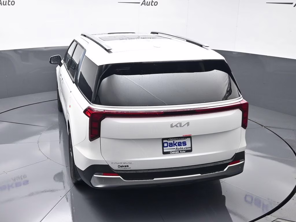 2026 Snow White Pearl Kia Carnival SX FWD Van