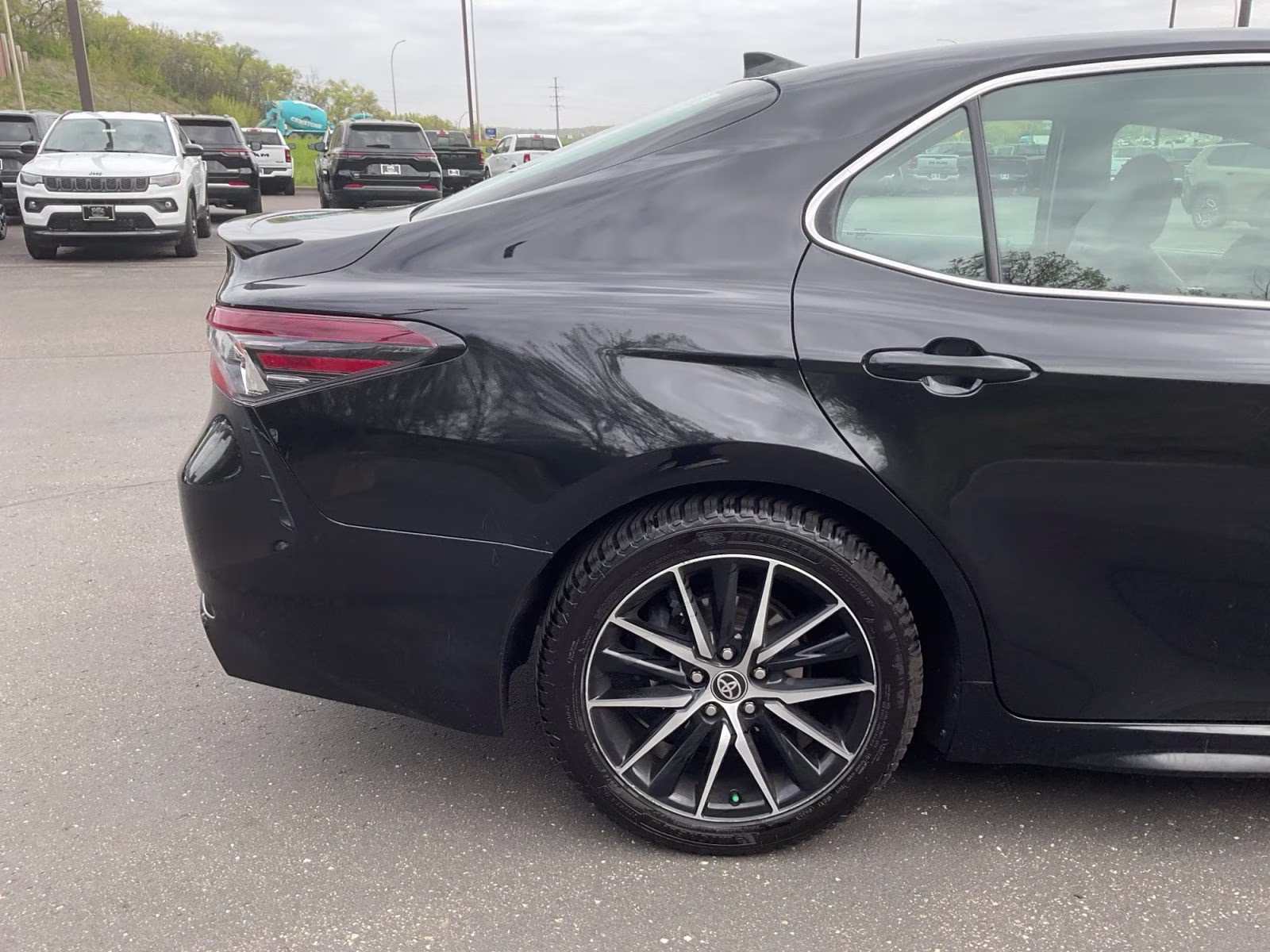 2021 Midnight Black Metallic Toyota Camry SE AWD Sedan