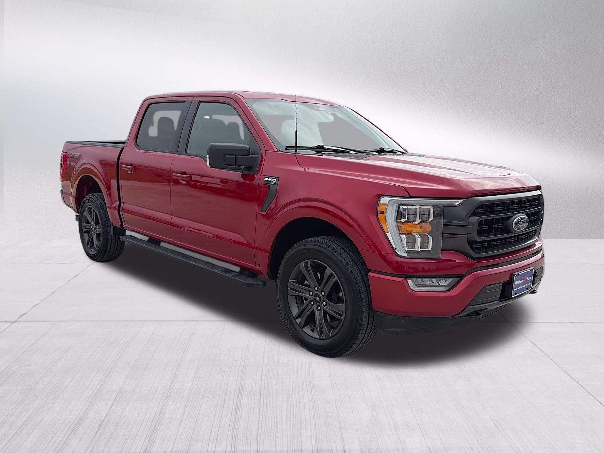 2023 Hot Pepper Red Metallic Tinted Clearcoat Ford F-150 XLT 4X4 Truck