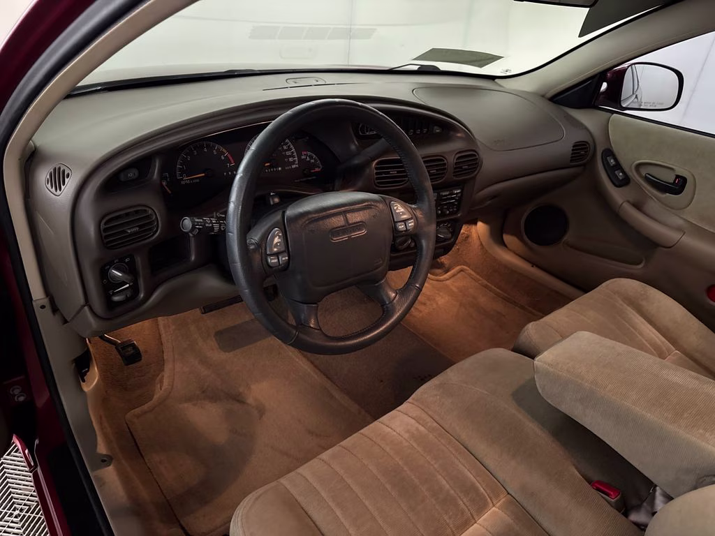 1998 Medium Red Metallic Pontiac Grand Prix SE FWD Sedan