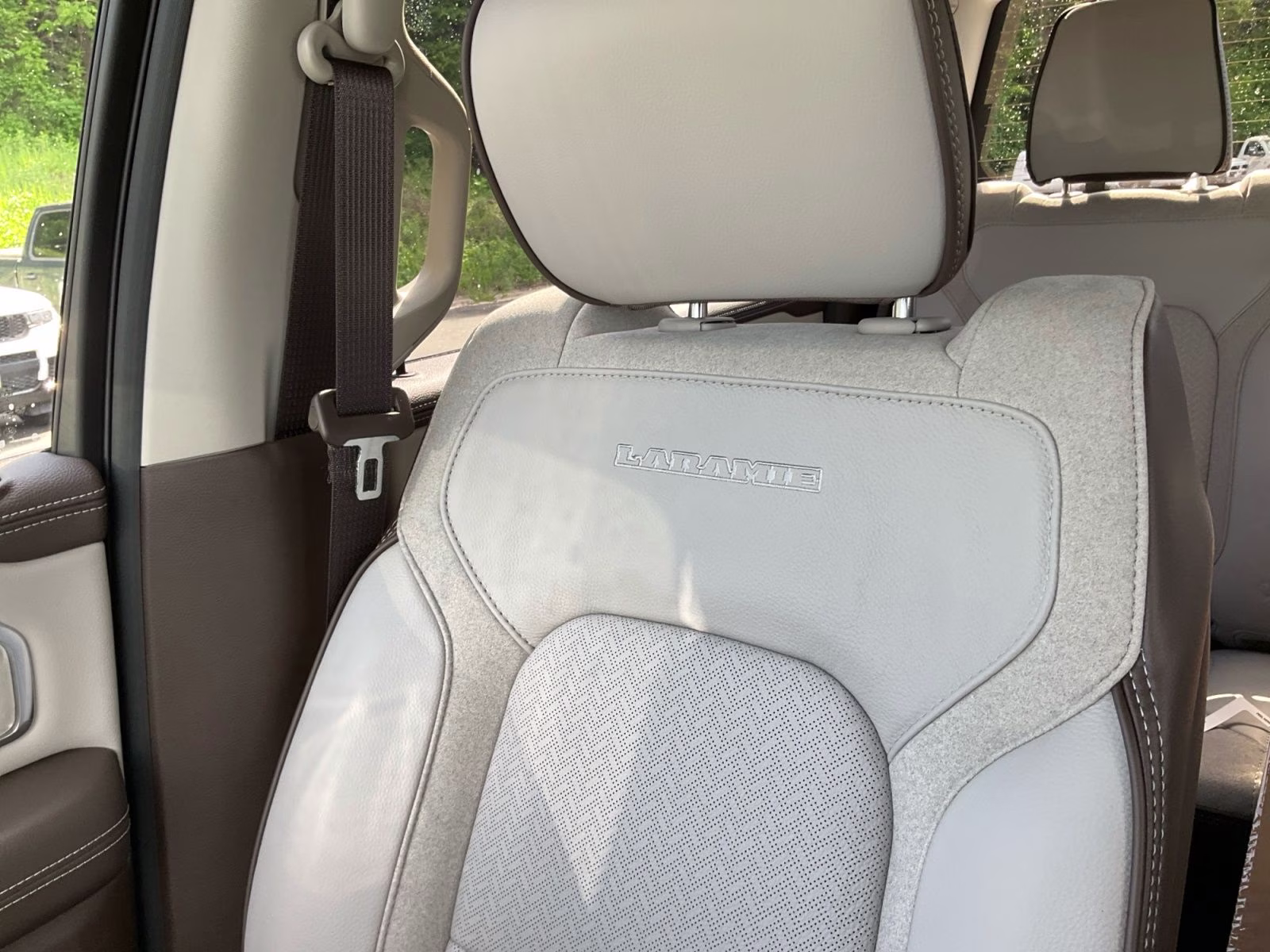 2026 Ivory White Tri-Coat Pearlcoat Ram 1500 Laramie 4X4 Truck