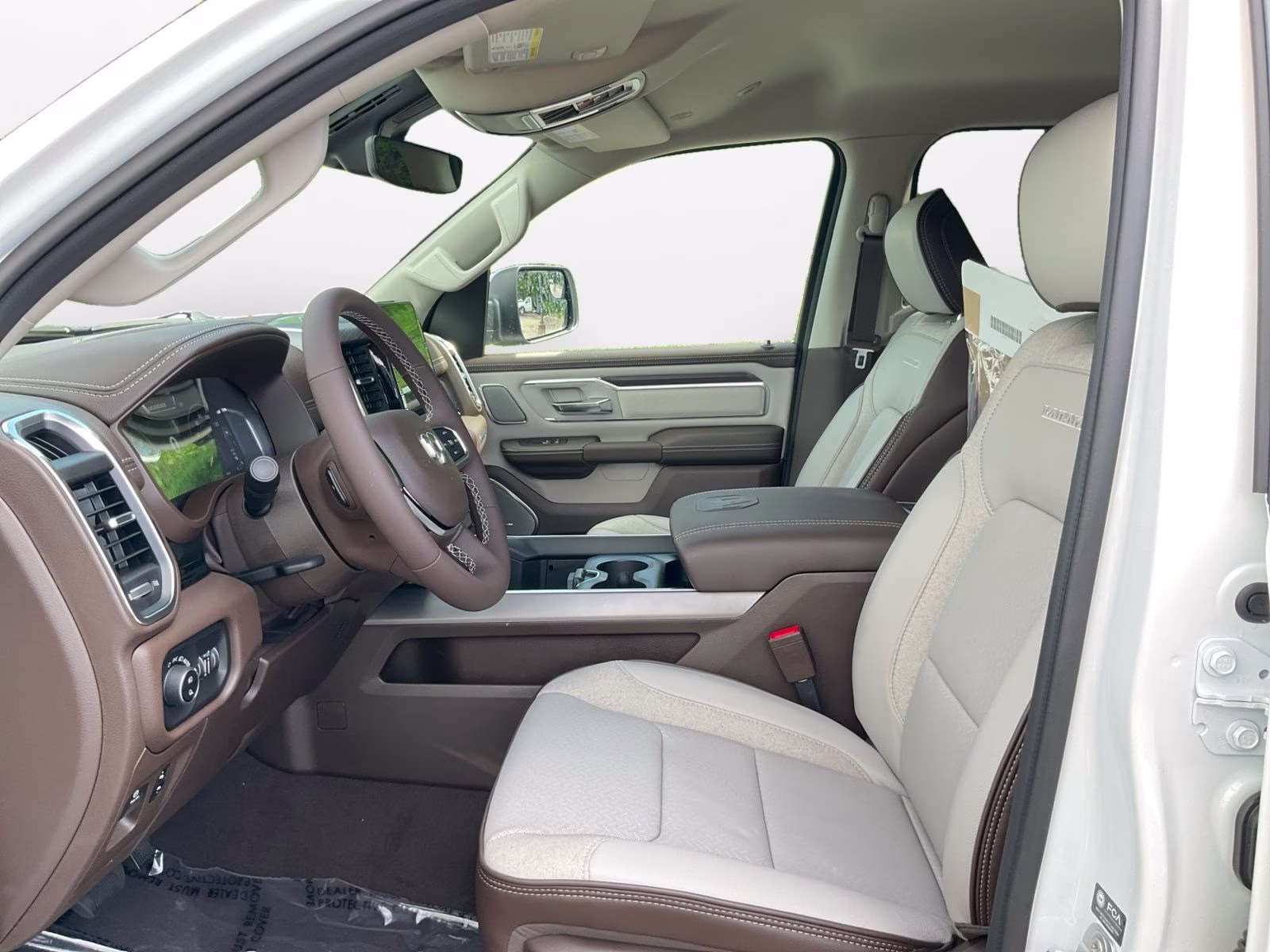 2026 Ivory White Tri-Coat Pearlcoat Ram 1500 Laramie 4X4 Truck