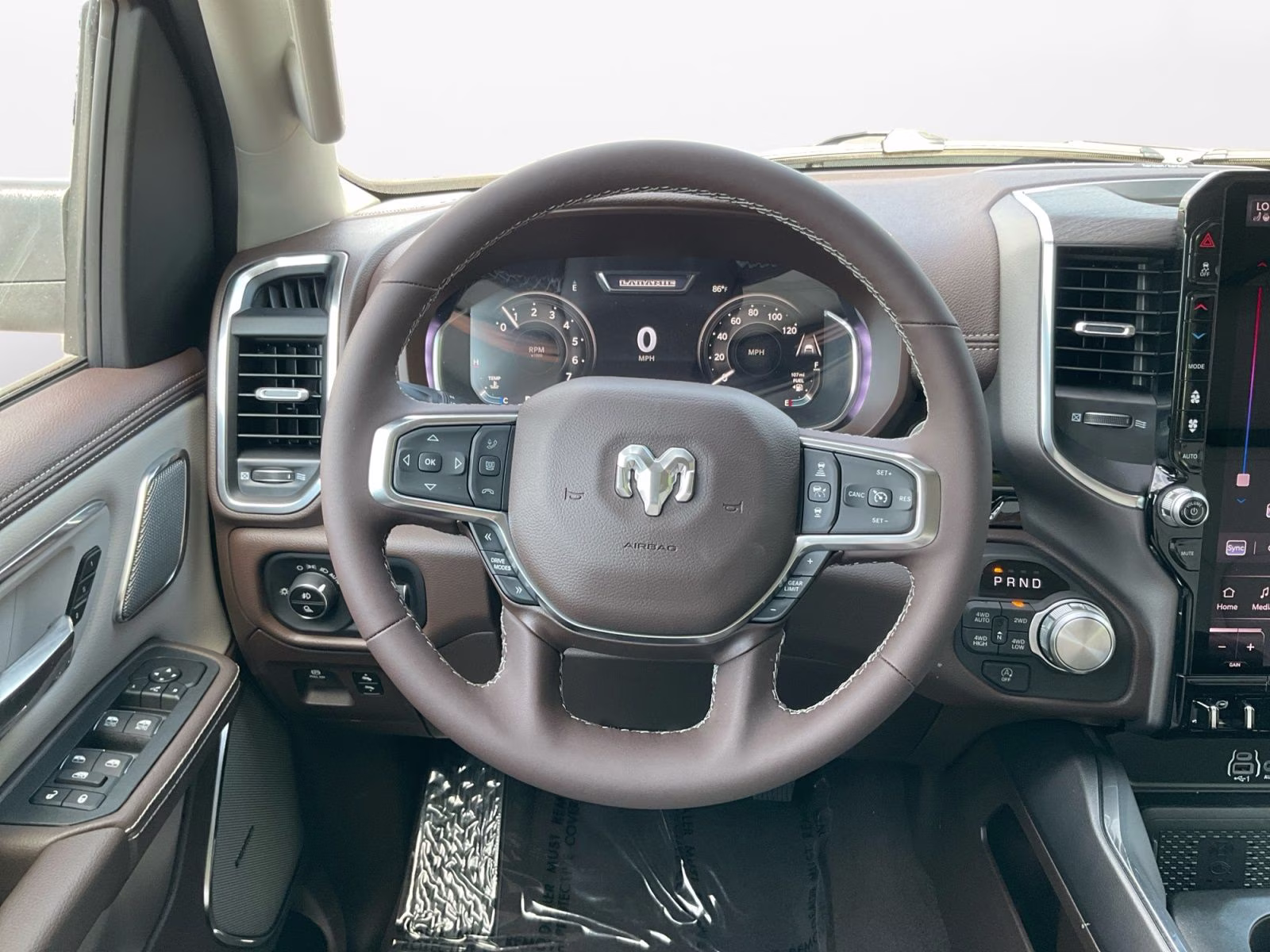 2026 Ivory White Tri-Coat Pearlcoat Ram 1500 Laramie 4X4 Truck