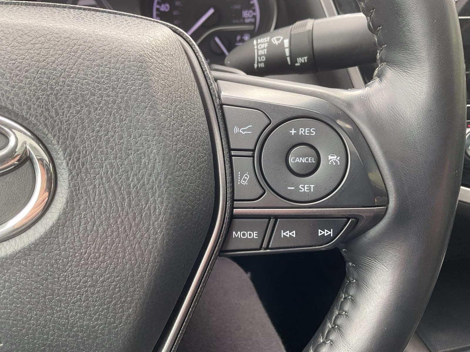 2021 Midnight Black Metallic Toyota Camry SE AWD Sedan