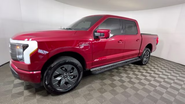 2023 Red Metallic Ford F-150 Lightning Lariat AWD Truck