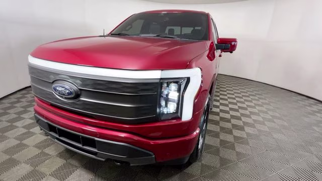 2023 Red Metallic Ford F-150 Lightning Lariat AWD Truck