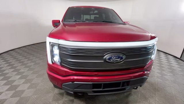 2023 Red Metallic Ford F-150 Lightning Lariat AWD Truck