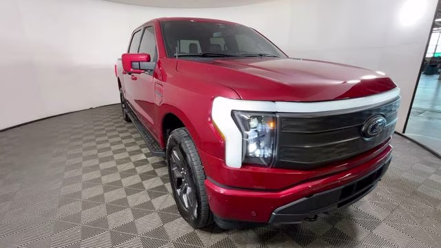 2023 Red Metallic Ford F-150 Lightning Lariat AWD Truck