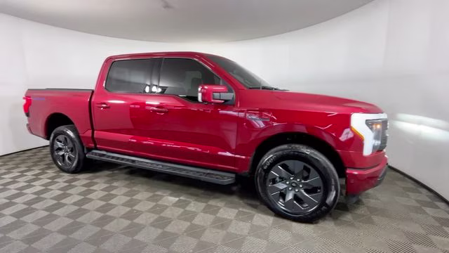 2023 Red Metallic Ford F-150 Lightning Lariat AWD Truck
