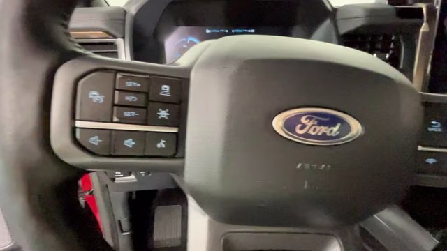 2023 Red Metallic Ford F-150 Lightning Lariat AWD Truck