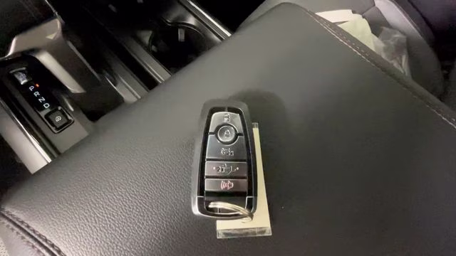 2023 Red Metallic Ford F-150 Lightning Lariat AWD Truck