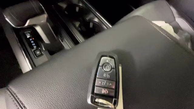 2023 Red Metallic Ford F-150 Lightning Lariat AWD Truck