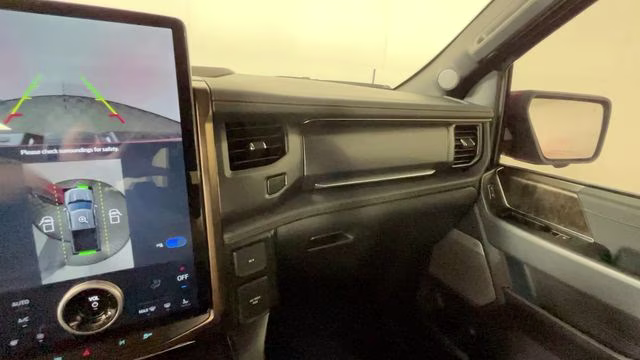 2023 Red Metallic Ford F-150 Lightning Lariat AWD Truck